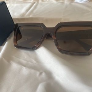 Louis Vuitton Millionare glasses.